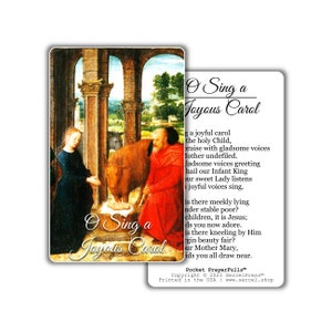 May include: Two prayer cards with a Christmas scene. One card features a painting of figures in a stable, with the text "O Sing a Joyous Carol." The other card has the carol lyrics.