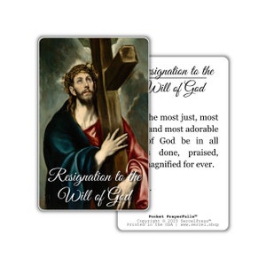 May include: A religious prayer card with a painting of Jesus carrying a wooden cross. The text on the card reads "Resignation to the Will of God".