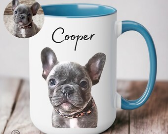 May include: White ceramic mug with a blue rim and handle. The mug features a cartoon illustration of a French bulldog with the name "Cooper" printed in black lettering.