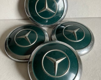 Enjoliveurs Mercedes Ponton W120. Lot de 4.