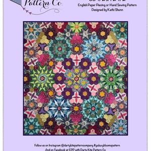 May include: A quilt pattern titled Galaxy Blooms by The Darty Kite Pattern Co. measuring 65-1/2 by 72-1/2 inches. The design features a complex, colorful geometric arrangement of floral and patterned fabric shapes in shades of pink, purple, green, and blue.