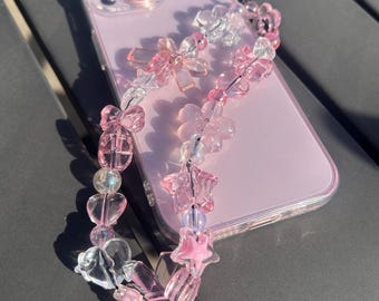 Bretelles roses irisées pour téléphone avec perles