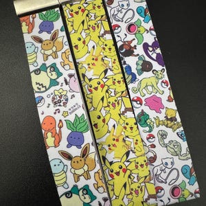 Sleutelhangers en horlogebandjes van imitatieleer met Pokémon-thema