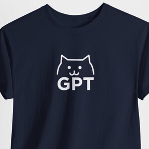 May include: A navy blue t-shirt featuring a white outline of a cat's face and the word "GPT" underneath.