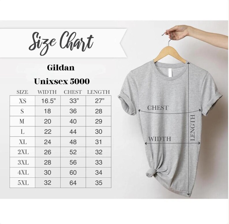 May include: A light gray Gildan Unisex 5000 t-shirt hanging on a wooden hanger. The image includes a size chart with measurements in inches for width, chest, and length, ranging from XS to 5XL.