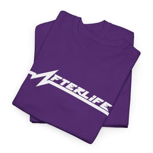May include: Two folded purple t-shirts. The shirts have a white graphic that reads "AFTERLIFE" in a stylized font. The graphic is angled across the front of the shirt.