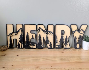 Personalized Mountain Forest Name Sign – Rustic Laser Cut Wooden Letters – Cabin & Nursery Wall Art – Adventure Home Decor Gift