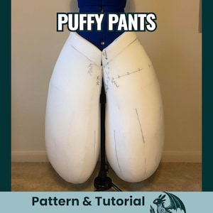 May include: White puffy pants pattern on a mannequin, with the text "PUFFY PANTS" above. The pants are large and rounded, with visible markings. The bottom of the image has the text "Pattern & Tutorial".