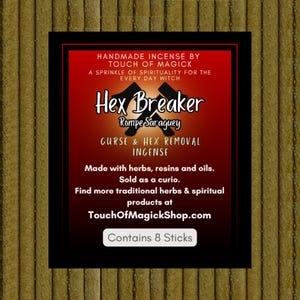 May include: A product label for "Hex Breaker" incense, with text in red and white on a black background. The label includes the text "CURSE & HEX REMOVAL INCENSE" and "Contains 8 Sticks". The background is a textured, golden-brown color.