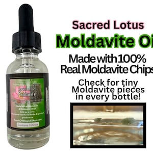 May include: A clear glass bottle with a black dropper top filled with a light green liquid. The bottle label reads "Sacred Lotus Moldavite Oil" and "Made with 100% Real Moldavite Chips". The label also states "Check for tiny Moldavite pieces in every bottle!" and "Contains 1 Ounce".