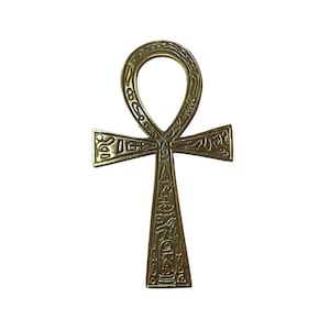 May include: A gold Ankh pendant with intricate hieroglyphic designs. The Ankh is a symbol of life and eternal life in ancient Egyptian mythology.