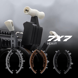 May include: A black and white 7x7 Heavy throttle control with a white lever and a brown and black ring. The throttle control is designed for use with a gaming console.