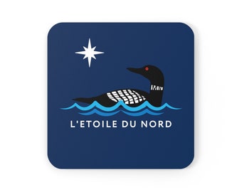 May include: A blue square coaster with a black loon swimming on blue water with a white star above it. The text "L'ETOILE DU NORD" is printed below the loon.