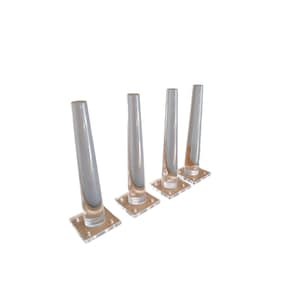 May include: Four clear acrylic furniture legs with square bases. Each leg is approximately 15 cm tall.