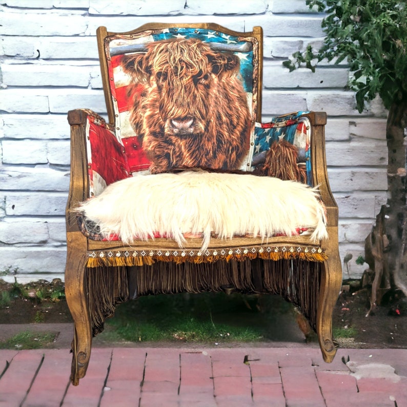 Elevate your farmhouse decor with this stunning Western Style Brown Leather Chair, a perfect blend of rustic charm and vintage appeal. Crafted from reclaimed wood and upcycled materials, this unique piece features a distressed brown leather frame that exudes cowboy cool. The upholstery is adorned with a striking Highland cow print, adding a touch of countryside authenticity, while the goat-skin hides drape gracefully over the seat, offering both comfort and texture.