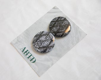 Juego de imanes con botones de piel de serpiente