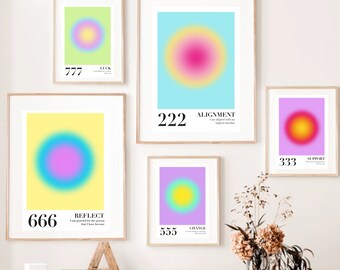 May include: Five framed prints with colorful gradient circles and text. The text on the prints reads "777 LUCK", "222 ALIGNMENT I am aligned with my highest timeline", "666 REFLECT I am grateful for the person that I have become", "555 CHANGE", and "333 SUPPORT".