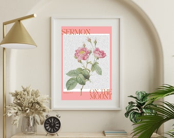 Pode incluir: Uma impressão floral rosa e branca com o texto "SERMON ON THE MOUNT" e "Matthew 5:1" em um fundo rosa. A impressão é emoldurada em uma moldura branca.