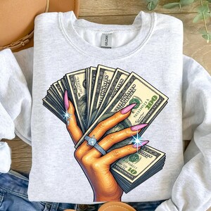 Mano con soldi in formato PNG, Clipart di unghie di ragazza ricca, Sublimazione di una pila di contanti scintillanti, Download digitale di uno stile di vita di lusso, Grafica di una ragazza boss per magliette