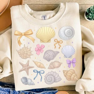 Conchas y lazos pastel PNG, paquete de imágenes prediseñadas de playa kawaii, descarga digital de conchas costeras y estrellas de mar, estética oceánica encantadora