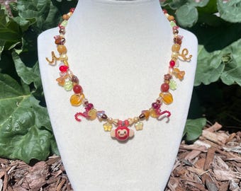 Apple Monkey Necklace: Handmade Polymer Clay, Czech Glass, and Pearl Beaded Jewelry
