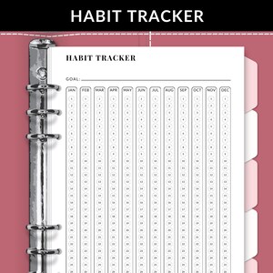 May include: A black and white habit tracker with a goal section at the top and columns for each month of the year. The tracker is designed for a binder and has a hole punch on the left side.