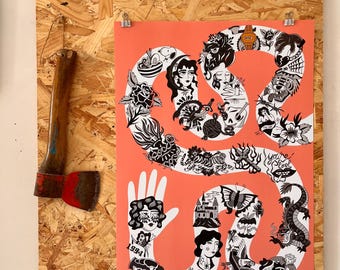 May include: A coral-colored art print featuring a stylized number 69 composed of various black and white tattoo-style illustrations. The print is mounted on a wooden board with an axe on the side. The artist's signature is visible.