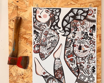 May include: Axe with a wooden handle and a red blade next to a framed print. The print features a detailed illustration of a person with tattoos in black, red, and white. The artwork is attached to a wooden board.