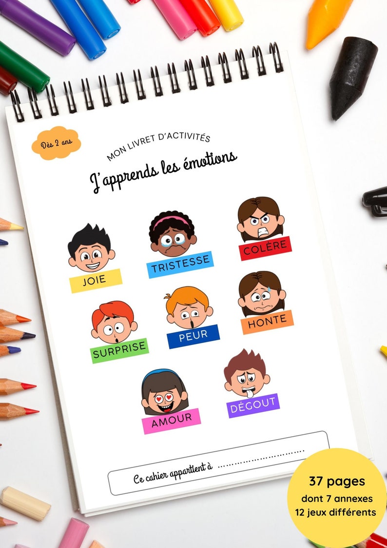 May include: A colorful activity book for 2-year-olds titled "J'apprends les &eacute;motions" (I learn emotions) with illustrations of different facial expressions and corresponding French words for emotions like joy, sadness, anger, surprise, fear, shame, love, and disgust. The book has 37 pages, including 7 annexes and 12 different games.