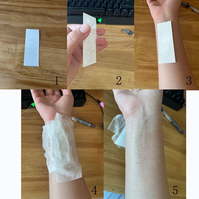 May include: A step-by-step guide on how to apply a temporary tattoo. The image shows a person applying a temporary tattoo to their arm. The tattoo is a simple design of a heart beat.