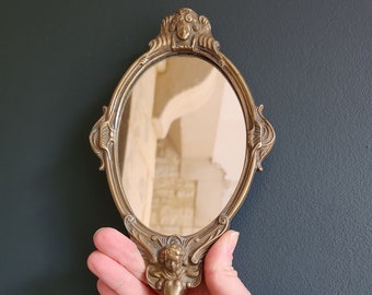 Magnifique miroir à main baroque en laiton doré motifs Ange, Cupidon