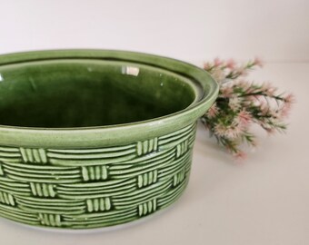 Vintage terrine dish with basket decor in green tones, slip style