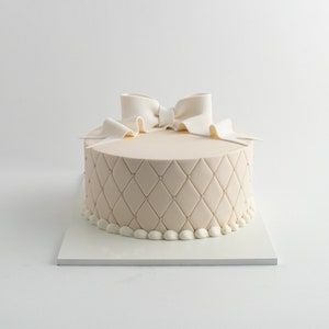 Bows and Pearls - Custom Cake - Carlo's Bakery