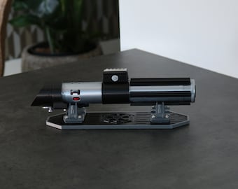 Darth Vader's Lightsaber Hilt - 'The Empire Strikes Back' Inspired Replica Cosplay Prop - Includes Empire Logo Stand