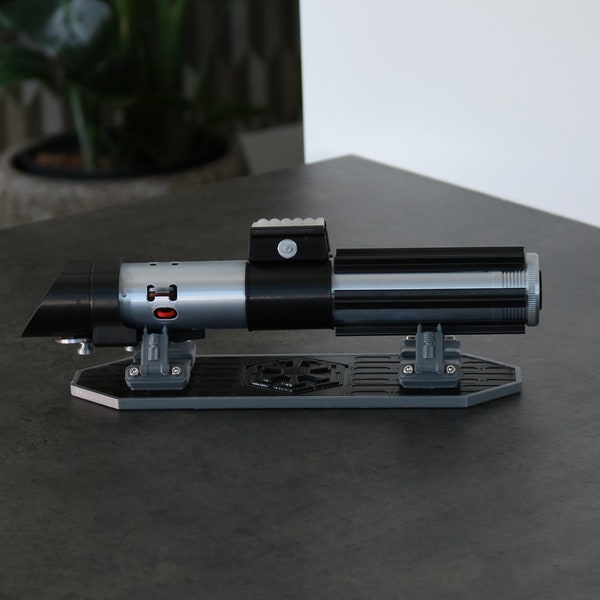 Darth Vader's Lightsaber Hilt - 'The Empire Strikes Back' Inspired Replica Cosplay Prop - Includes Empire Logo Stand