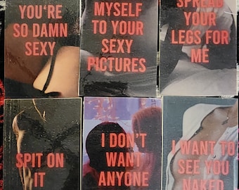 May include: A collection of six black rectangular cards with red text and suggestive imagery. The cards feature phrases like "YOU'RE SO DAMN SEXY" and "I TOUCH MYSELF TO YOUR SEXY PICTURES."