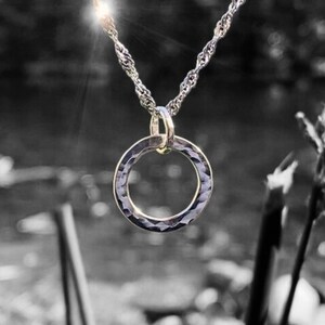 Hand-forged silver pendants