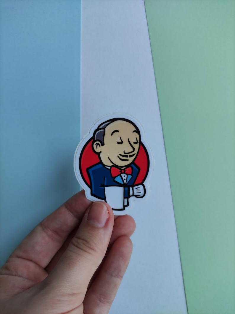 Peut inclure: Un autocollant repr&eacute;sentant un dessin anim&eacute; d'un homme en costume bleu et cravate rouge tenant une tasse de caf&eacute;. L'homme a une moustache et sourit. L'autocollant est sur un fond blanc.