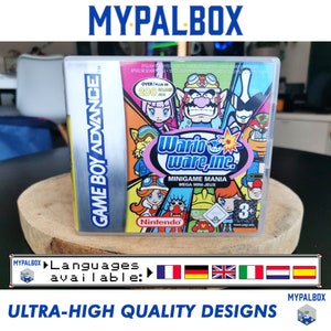 Puede incluir: Un cartucho de juego Game Boy Advance plateado para WarioWare, Inc.: Minigame Mania. El juego presenta un diseño colorido con personajes del juego, incluido Wario, y el texto "Over/Plus de 200 Games/Jeux".