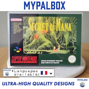 Puede incluir: Un cartucho de juego Super Nintendo para Secret of Mana en una caja de plástico transparente. El juego está en francés. La caja tiene una pegatina que dice "Idiomas disponibles: francés".