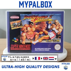 May include: A Super Nintendo game cartridge case for "Street Fighter II Turbo." The case displays a vibrant image of two fighting characters. The text "MYPALBOX" and "ULTRA-HIGH QUALITY DESIGNS" are also visible on the case.