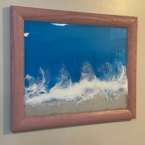 Pink frame, white sand beach