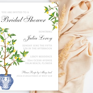 May include: A bridal shower invitation featuring a lemon tree design and elegant script. The invitation includes the text "You are invited to a Bridal Shower" and details for Julia Leroy's shower.