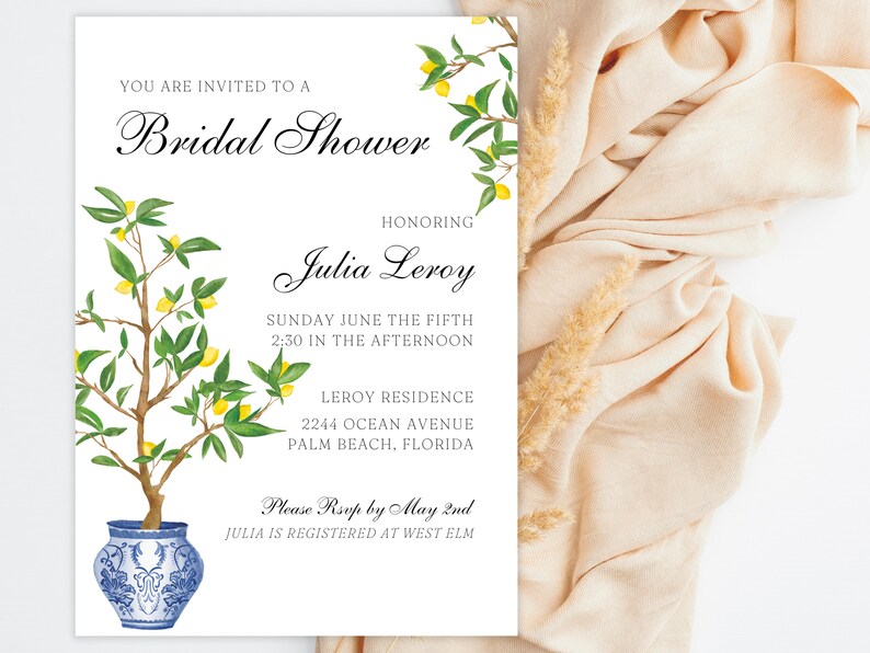 May include: A bridal shower invitation featuring a lemon tree design and elegant script. The invitation includes the text "You are invited to a Bridal Shower" and details for Julia Leroy's shower.