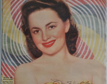 OLIVIA DeHAVILLAND Rivista cinematografica autografata - Via col vento 11"x14" con certificato di autenticità