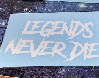 May include: White vinyl decal with the words "Legends Never Die" in a bold, stylized font.