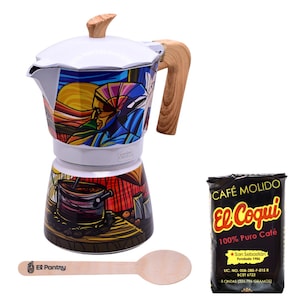 May include: A white and colorful stovetop espresso maker with a wooden handle and lid. The espresso maker has a vibrant design with a bag of El Coqui ground coffee and a wooden spoon. The coffee bag reads "Café Molido El Coqui".