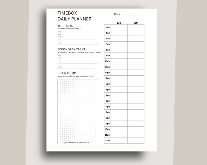 May include: A black and white daily planner with the title "TIMEBOX DAILY PLANNER". The planner has sections for "Top Tasks", "Secondary Tasks", and "Brain Dump". There is a time grid from 4am to 12am with columns for :00 and :30.