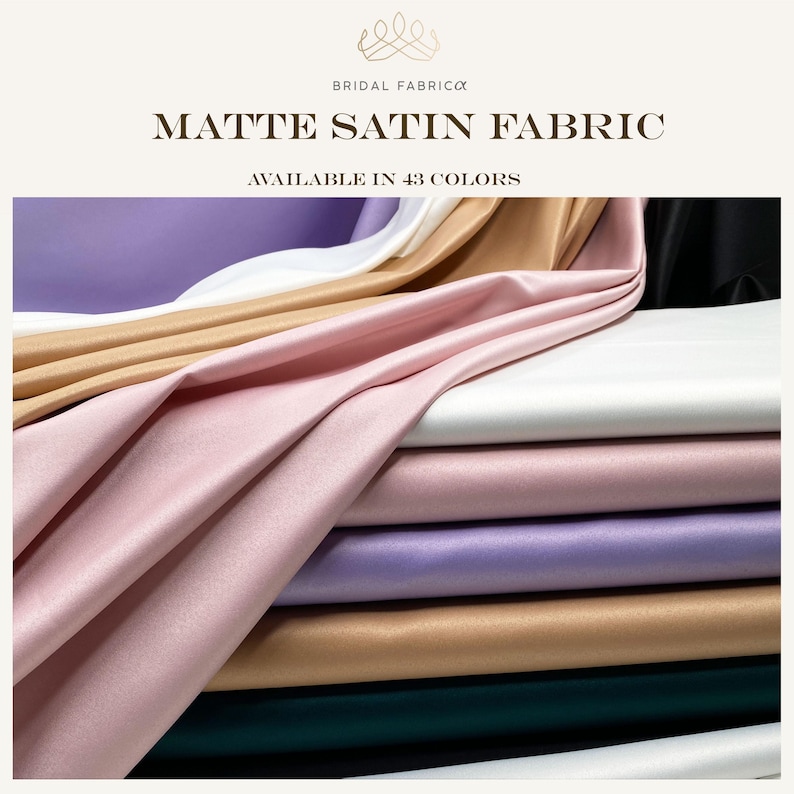 Elegant matte satin fabric draped in a luxurious display, showcasing a selection of 43 available colors including blush pink, champagne, ivory, lilac, and deep green—perfect for bridal gowns, bridesmaid dresses, and evening wear. High-quality satin texture with a soft matte finish, ideal for Pinterest inspiration boards for weddings, formal events, and couture designs.