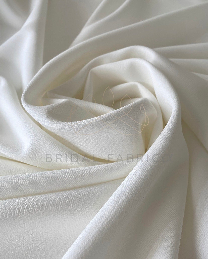 Natural White/Ivory Triple Crepe Fabric | Fabrics Galore